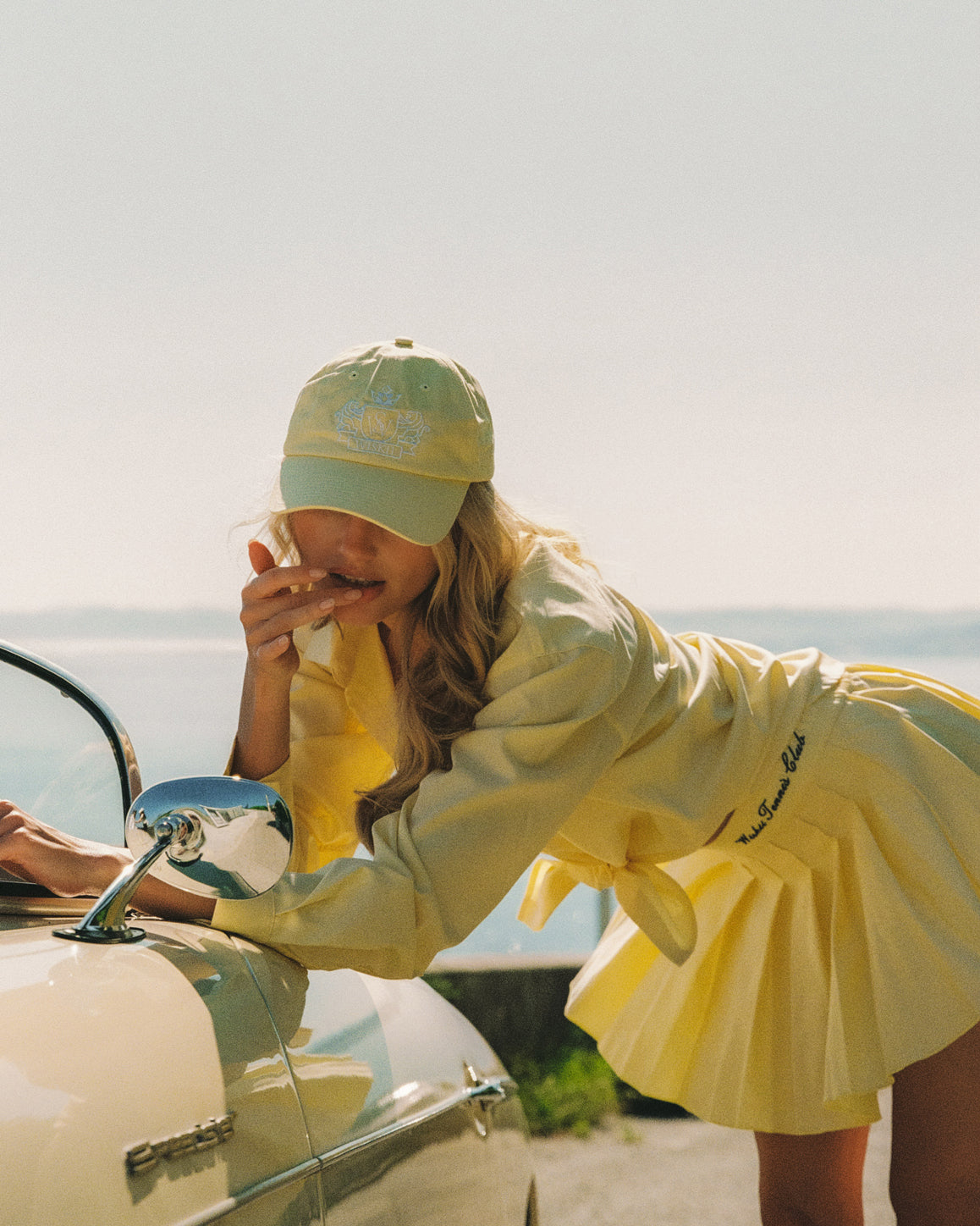 WISKII Riviera pleated skirt in a flowing design, showcasing elegant pleats and a stylish silhouette.