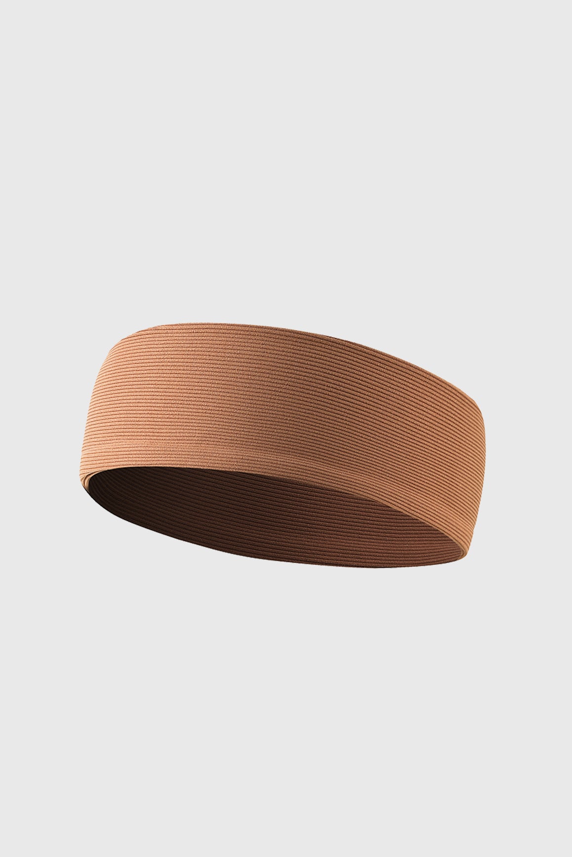 WISKII stretchy ribbed cinnamon-colored headband, a stylish accessories piece for active or casual wear.