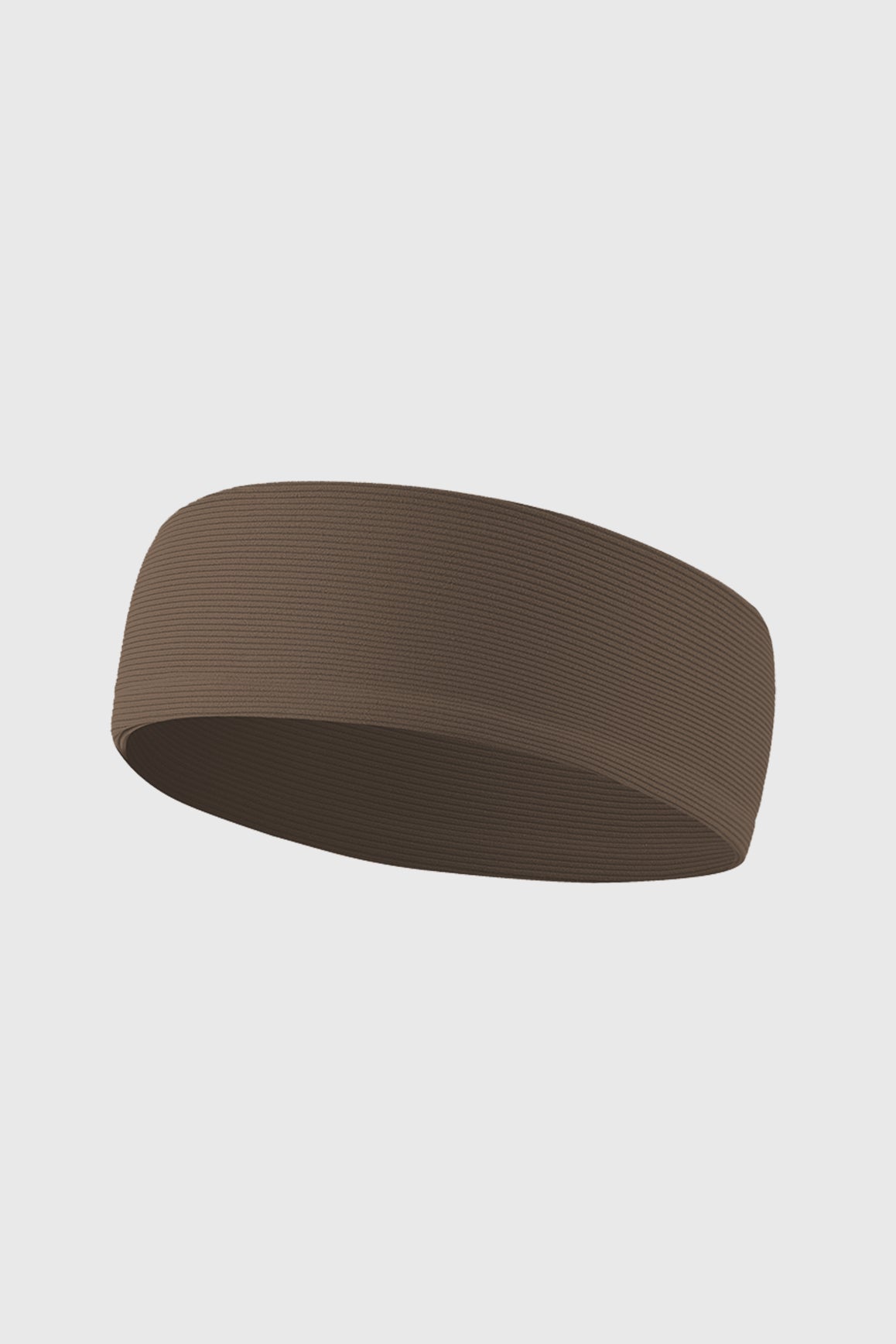 Stretchy ribbed headband in desert truffle color by WISKII, a stylish accessories piece with comfortable, flexible fit.