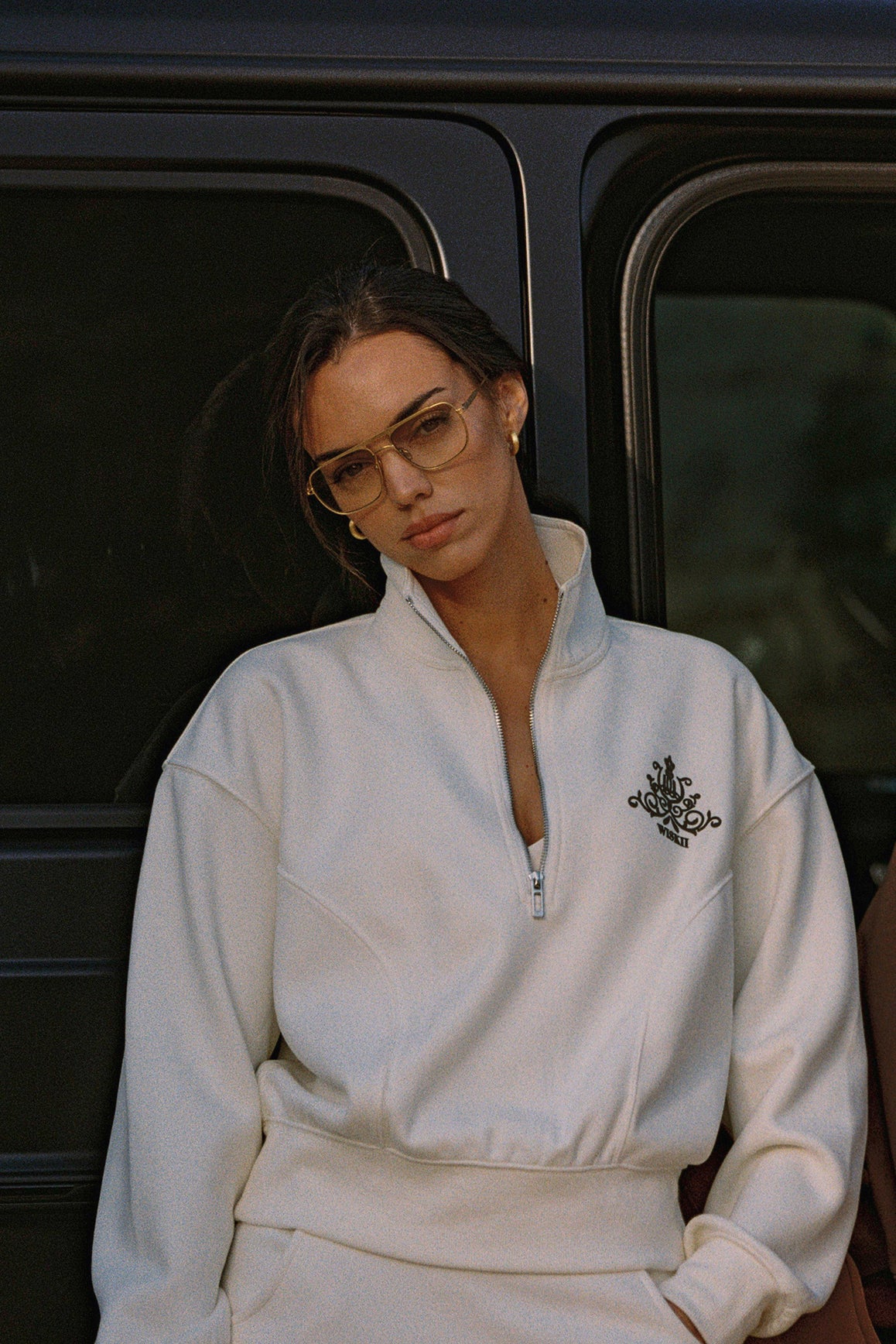 Model wears Leisure Half-zip Sweatshirt