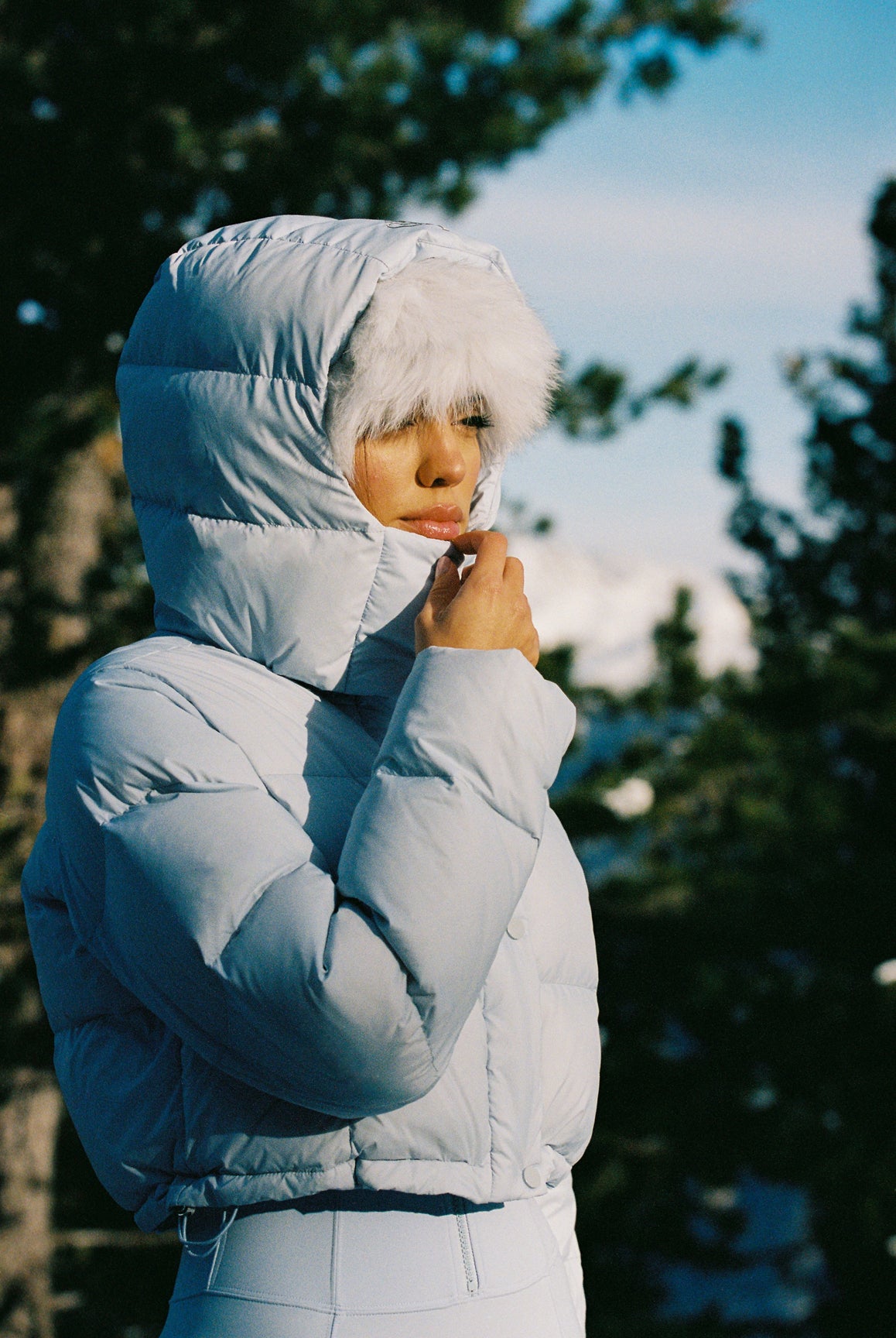 Model wears WISKII Goose Down Water-Repellent Jacket | WISKII Active | Heavenly Blue