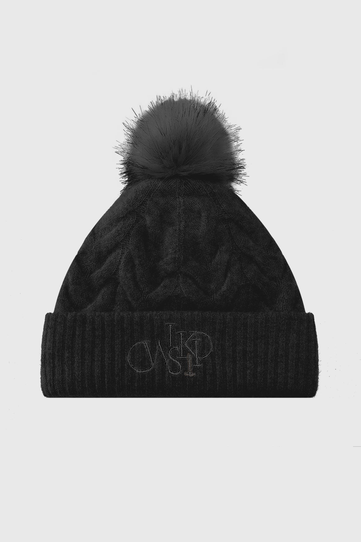WISKII chunky cable knit beanie hat in cozy, thick wool with a textured cable pattern, perfect for winter accessories.