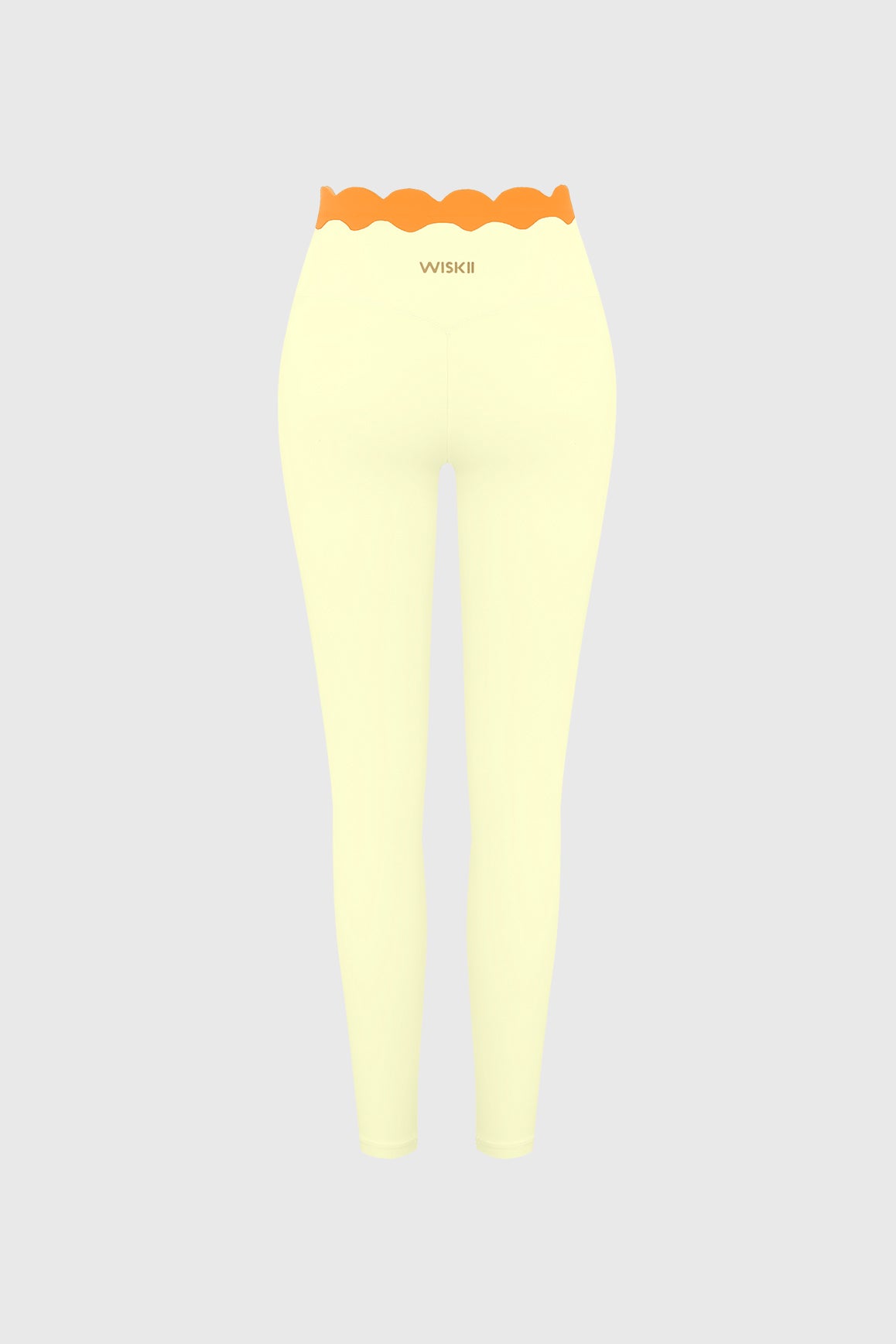 WISKII scallop contrast scrunch leggings in black with white scallop details, form-fitting athletic leggings with a scrunch back design.
