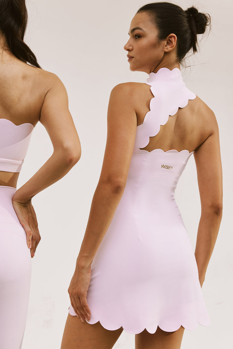 Model wears Scallop Back Mock Neck Dress | Ballet Blush| WISKII Active