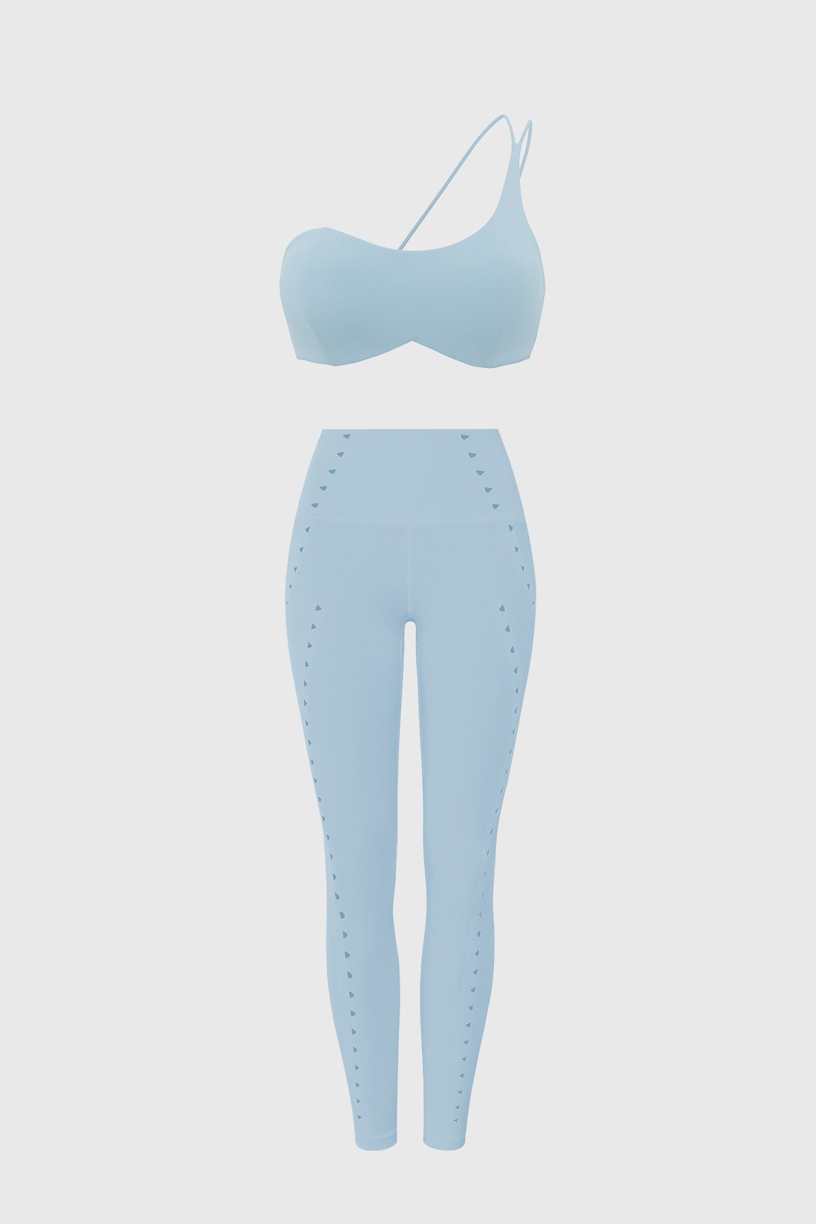 WISKII bundle with one-shoulder contour bra and laser-cut training leggings in Belair blue, designed for active wear.