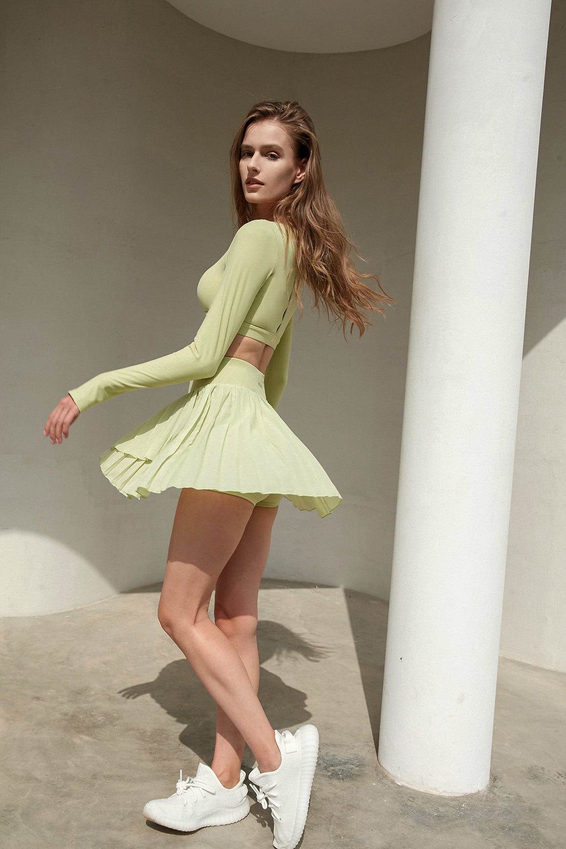 Model wears Kono Long Sleeve Crop Top | WISKII