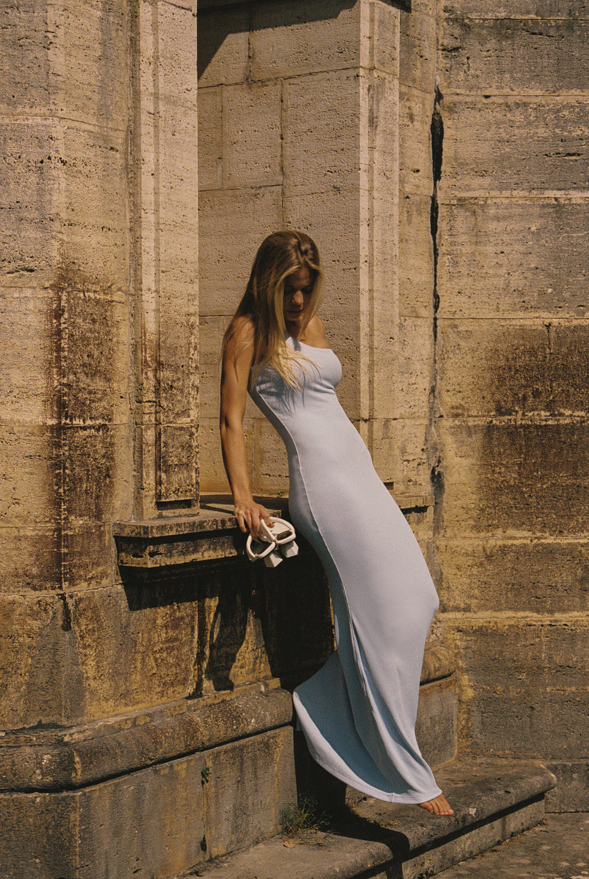 WISKII one-shoulder sleeveless floral dress in heavenly blue, featuring a flowy design and vibrant flower pattern.