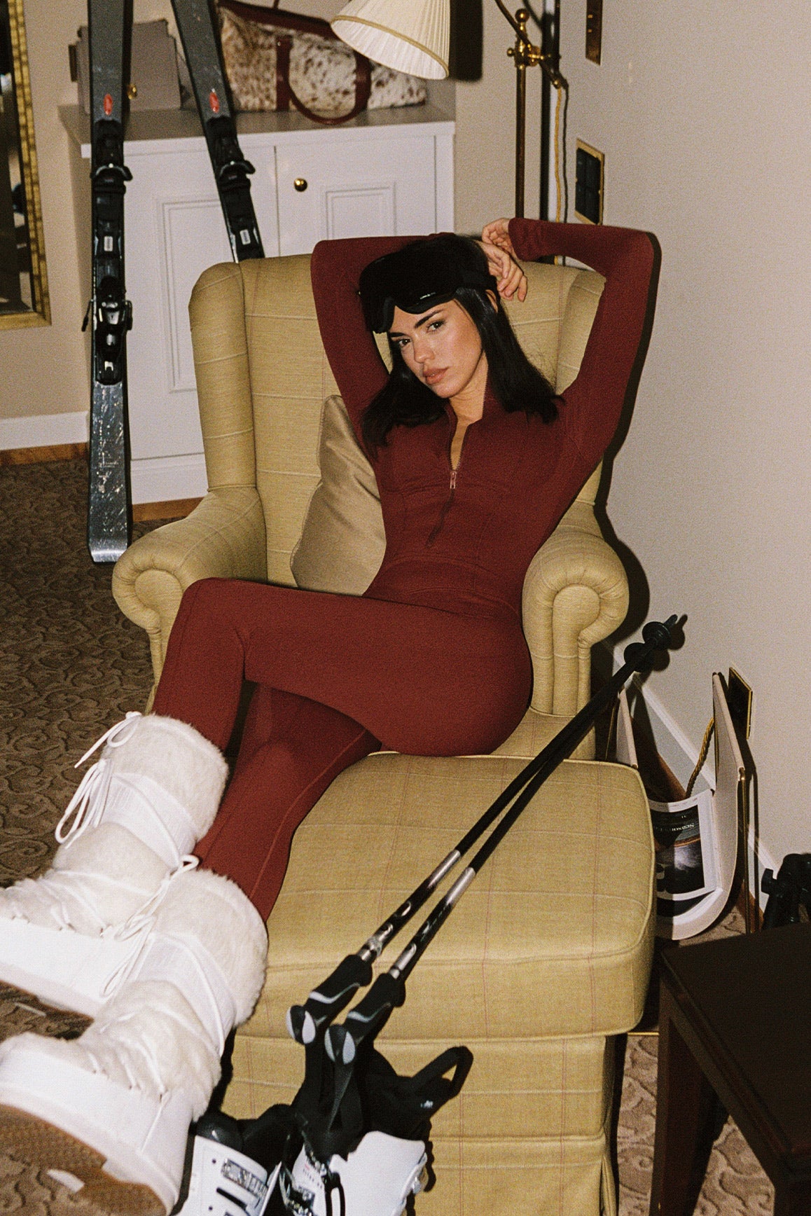 WISKII Solace Tailored Zip Catsuit, a deep mulled wine jumpsuit with a fitted design and front zipper, perfect for stylish outfits.