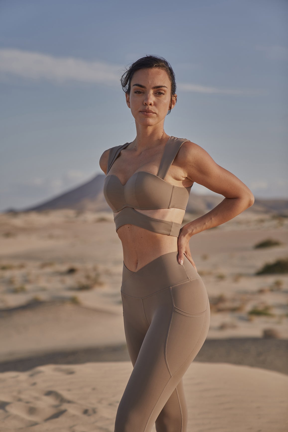 WISKII V-Waist Utility Leggings in almond butter color, stretchy leggings with a V-shaped waistband and utility-style design.