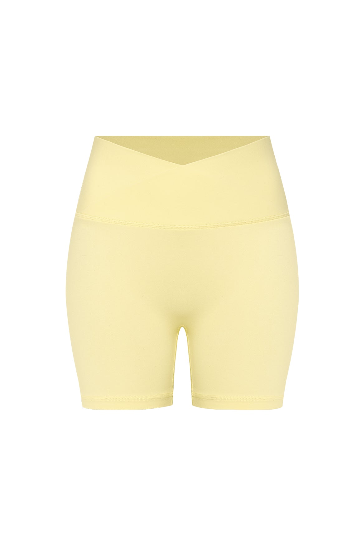 Ivory WISKII Riviera V-Waist Scrunch Shorts displayed on a model, showcasing their stylish fit and V-shaped waistband.