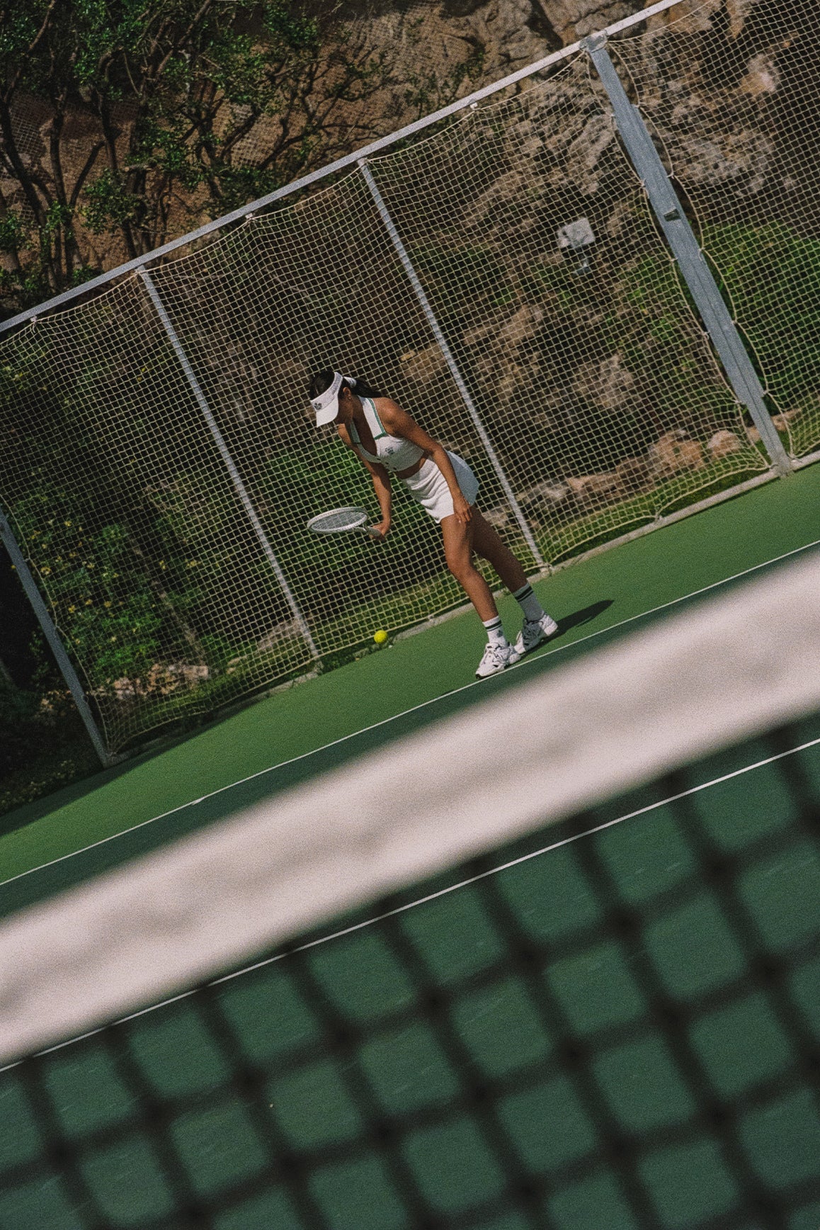 WISKII Riviera Jacquard Knit Skirt in white, showing a close-up of the textured woven fabric and high-waisted design.