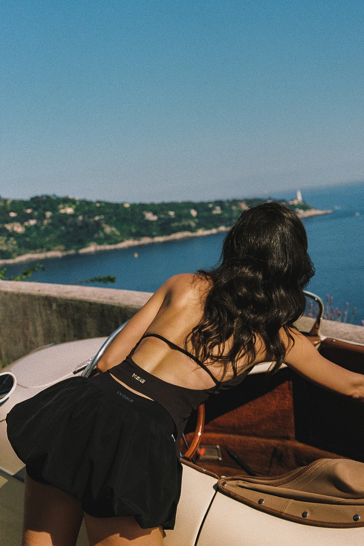 Model wears a Riviera Floral Halter Vest | Black | WISKII Active