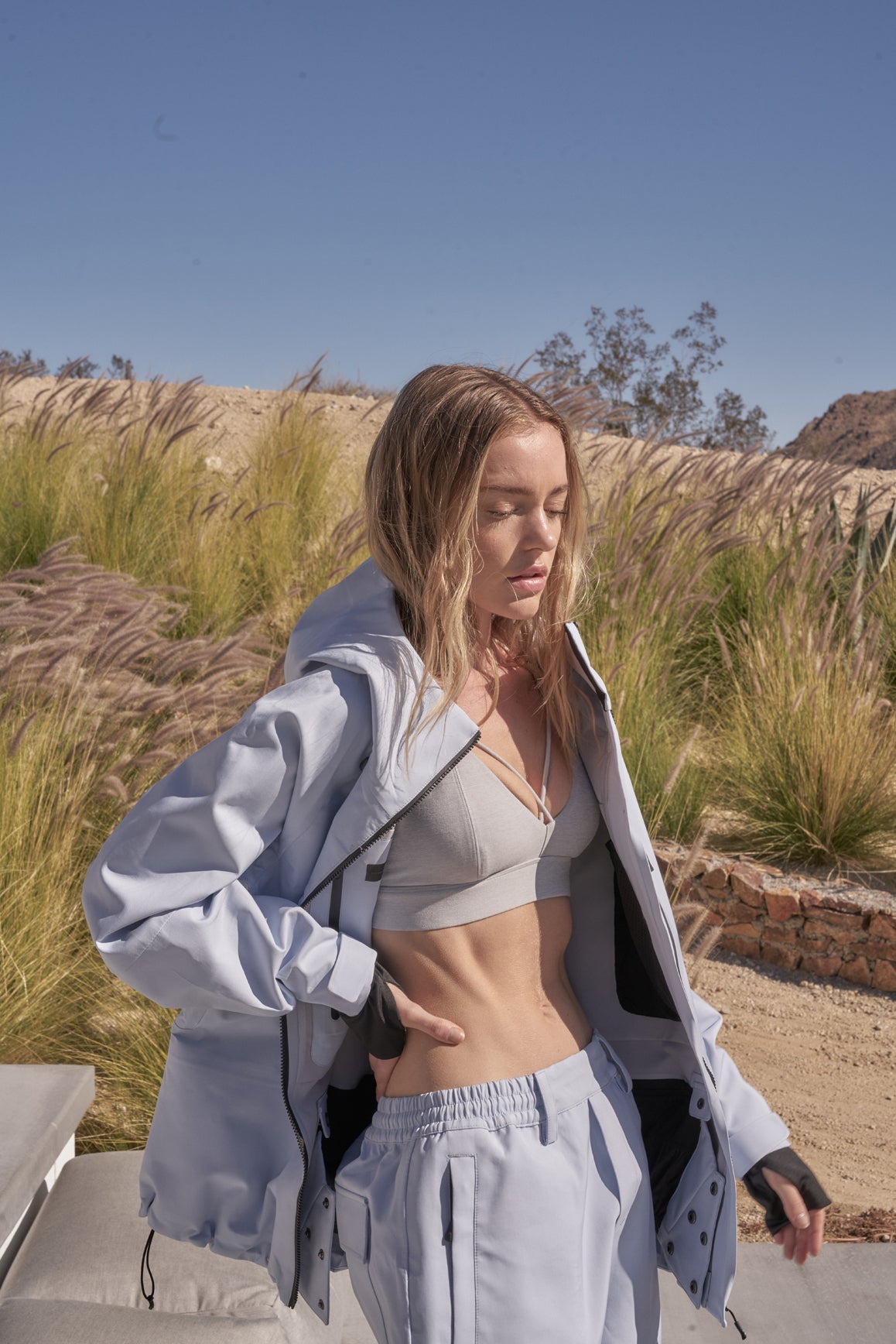 WISKII Suit Yourself Sports Bra in surf color, featuring a supportive design with adjustable straps and breathable fabric for active wear.