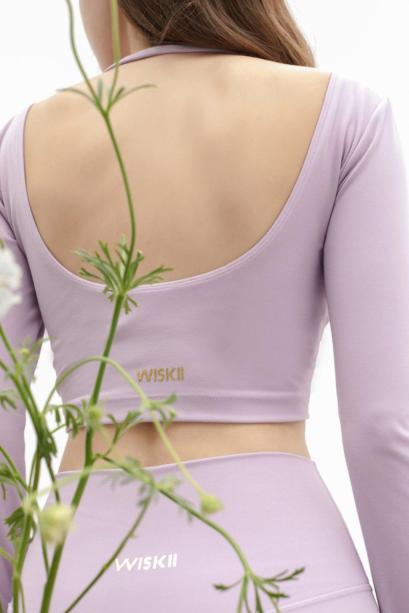 model wears a WISKII meli crop top